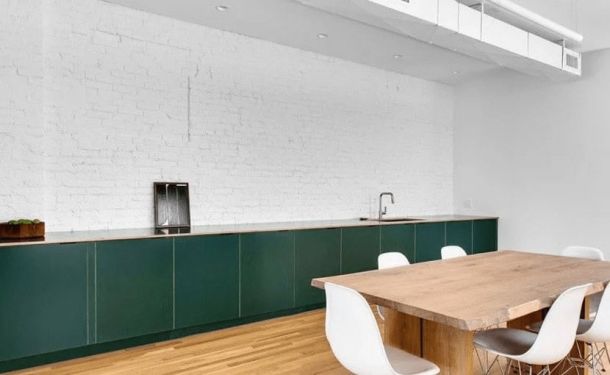 A clean and minimalist kitchen and dining space at a drug and alcohol rehab center in Louisville, KY, designed to provide a comfortable environment for residents.