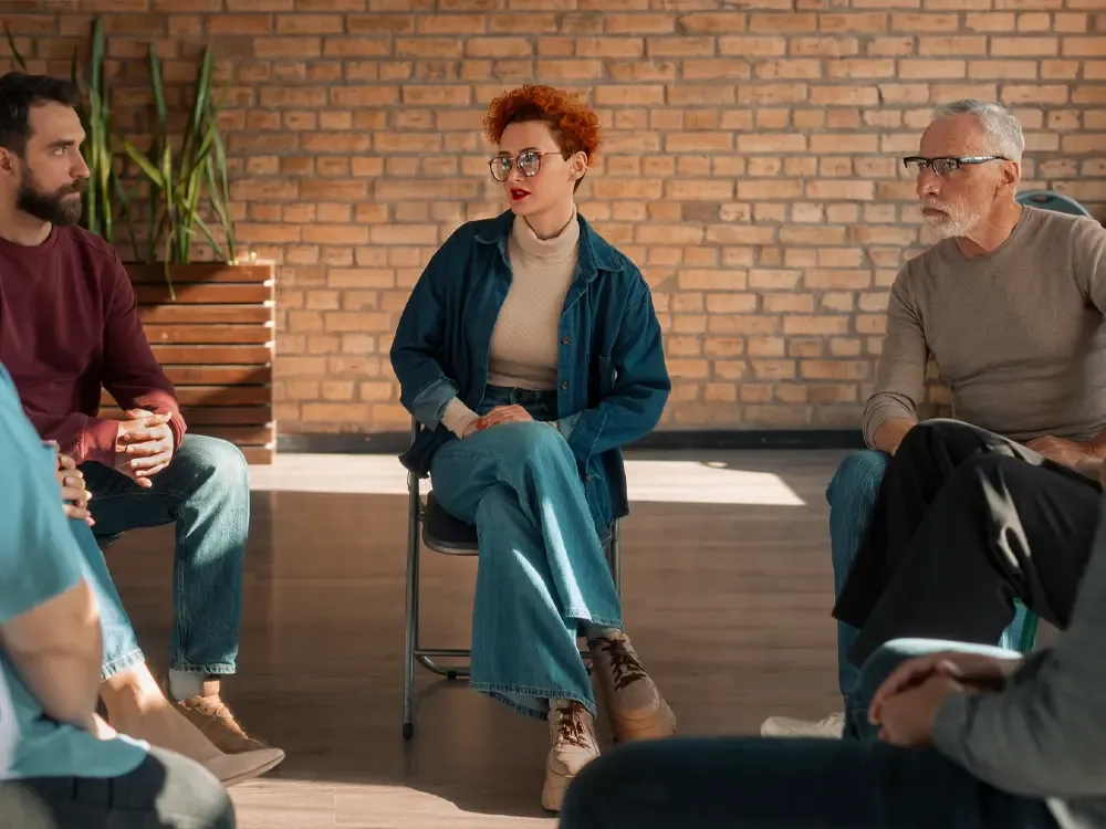 A supportive group therapy session at a drug and alcohol detox center in Nashville, fostering connection and recovery in a welcoming environment.