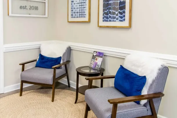 A serene bedroom at a Drug and Alcohol Rehab Center in Murfreesboro, offering a calming environment for recovery and rest.