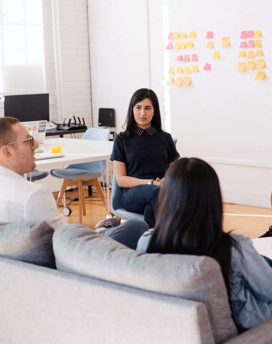 A supportive group therapy session taking place in a bright and modern setting, highlighting the comprehensive care at drug and alcohol treatment centers in Kentucky.
