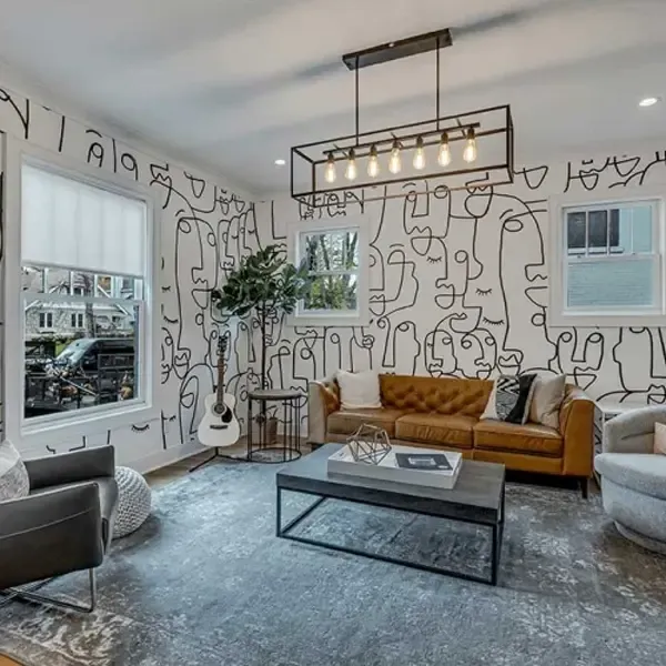 A vibrant and creatively designed lounge area with artistic wall decor, representing the inspiring environments found at drug and alcohol treatment centers in Tennessee.